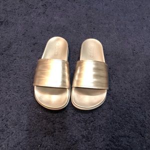 Silver adidas slides